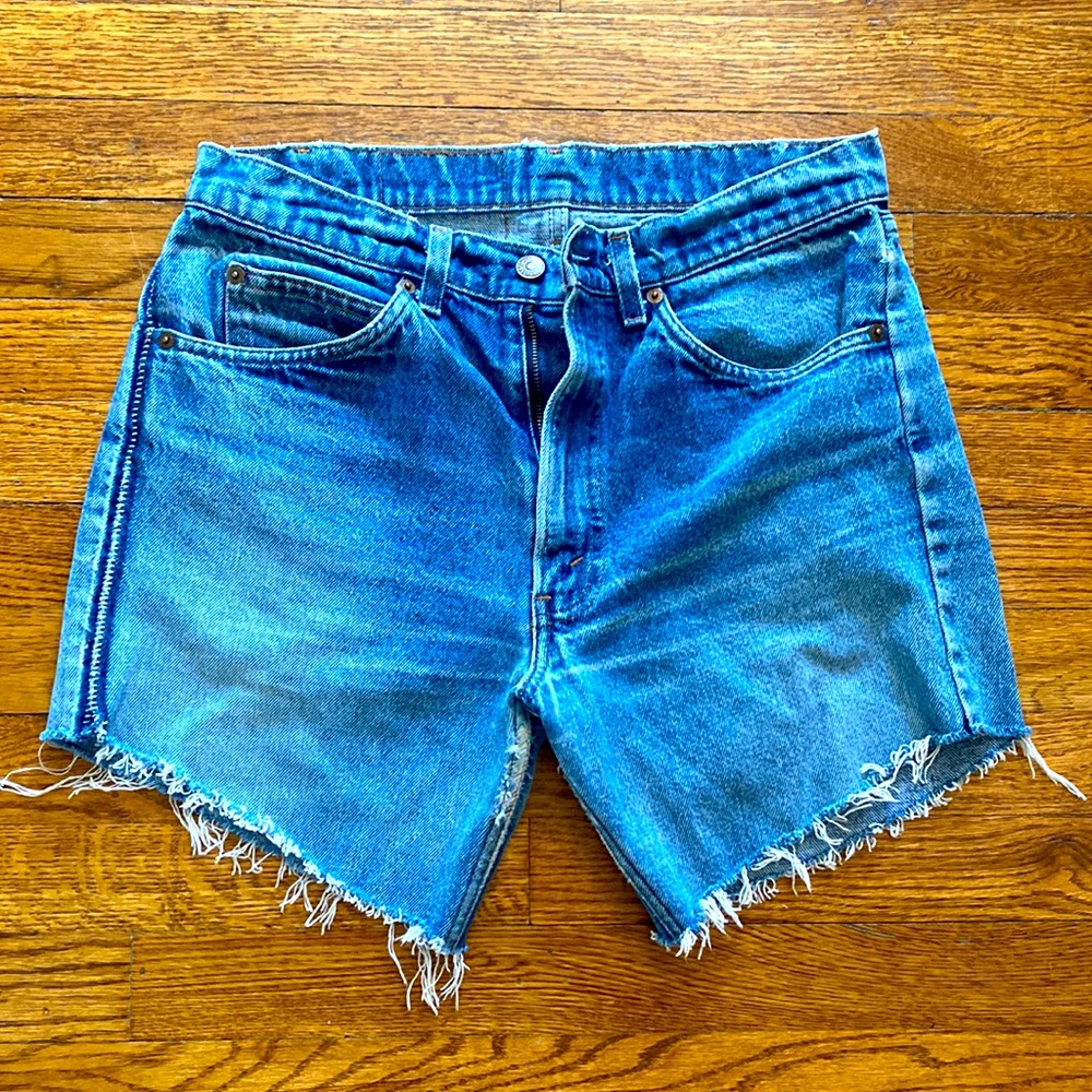 Vintage Levi’s cut off shorts, distressed orange tag